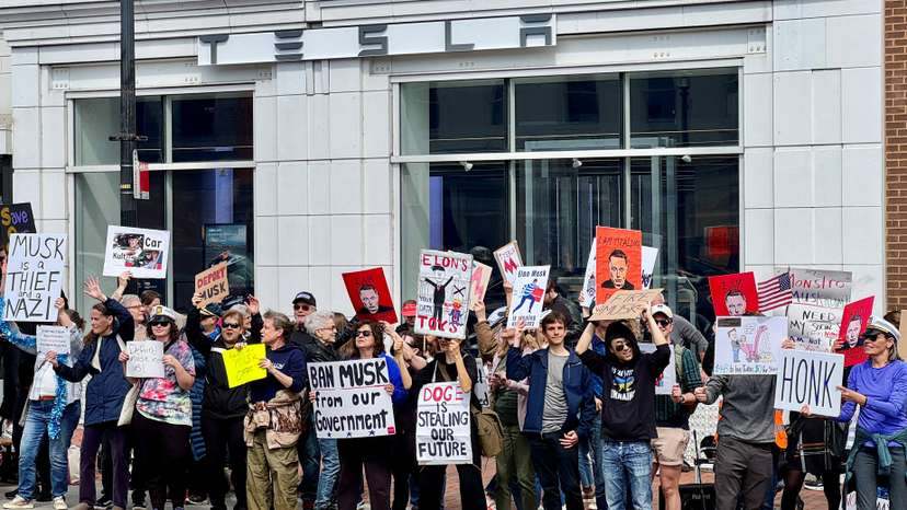 Protest against Elon Musk outside a Tesla dealership in Washington