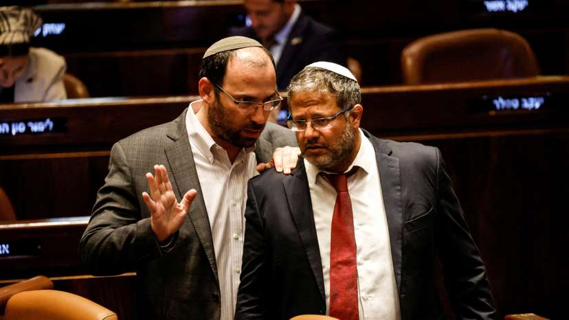 FILE PHOTO: Israeli lawmakers gather at the Knesset plenum to vote on a bill that would limit some Supreme Court power, in Jerusalem