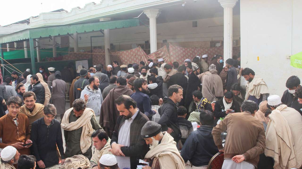 Residents from Tirah valley, who fled a remote mountainous region bordering Afghanistan, gather to get themself registered, in Bara