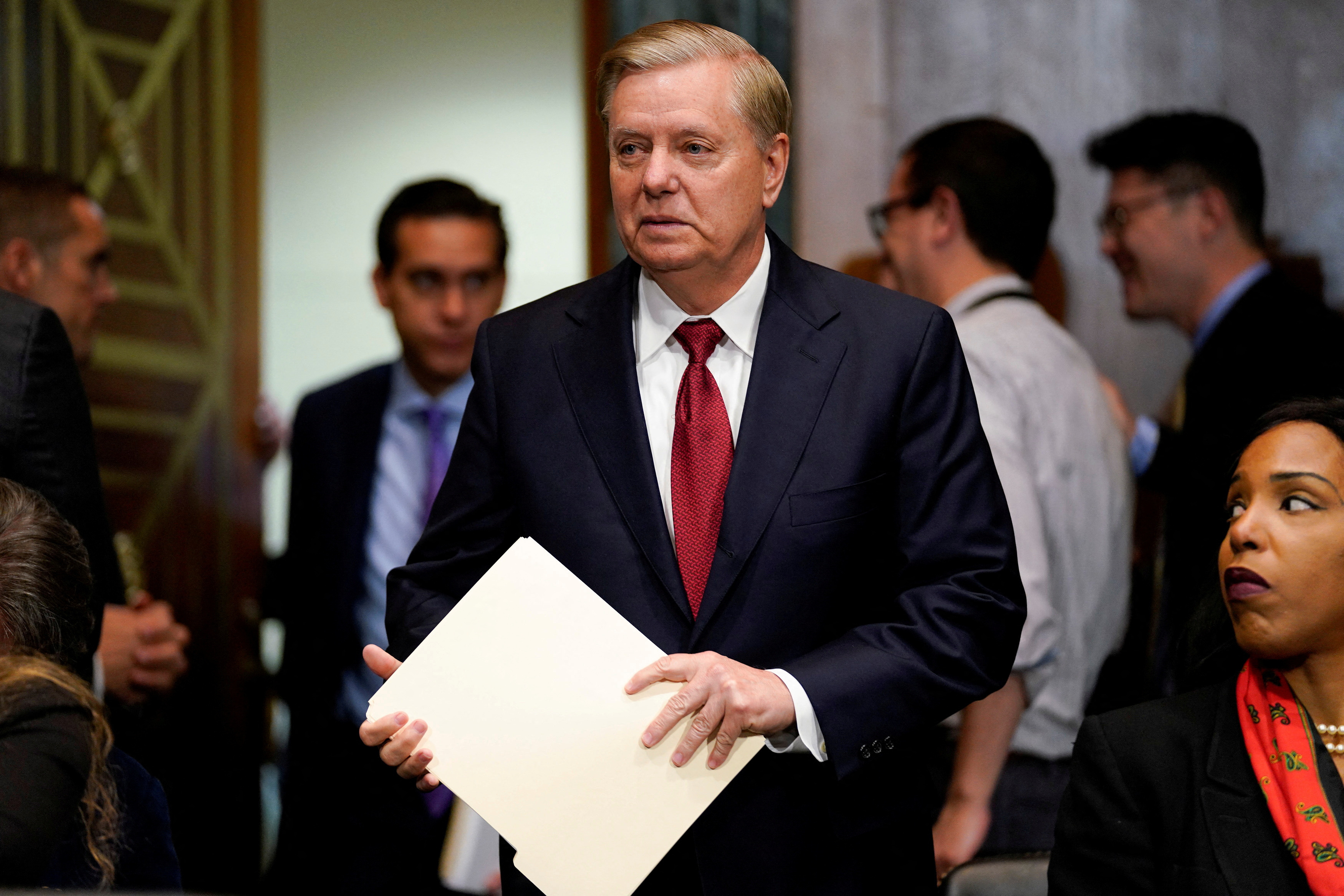 FILE PHOTO: Sen. Lindsay Graham (R-SC) arrives ahead of U.S. Attorney General William Barr testifying before a Senate Judiciary Committee hearing entitled "The Justice Department's Investigation of Russian Interference with the 2016 Presidential Election.