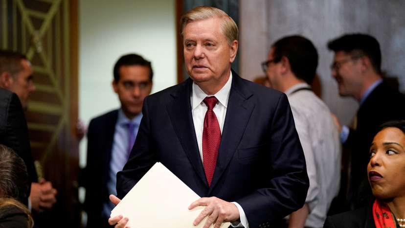 FILE PHOTO: Sen. Lindsay Graham (R-SC) arrives ahead of U.S. Attorney General William Barr testifying before a Senate Judiciary Committee hearing entitled "The Justice Department's Investigation of Russian Interference with the 2016 Presidential Election.