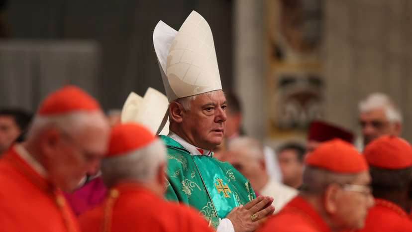 Newly elected cardinal Gerhard Ludwig Muller of Germany arrives during a consistory ceremony led by Pope Francis in Saint Peter's Basilica at the Vatican
