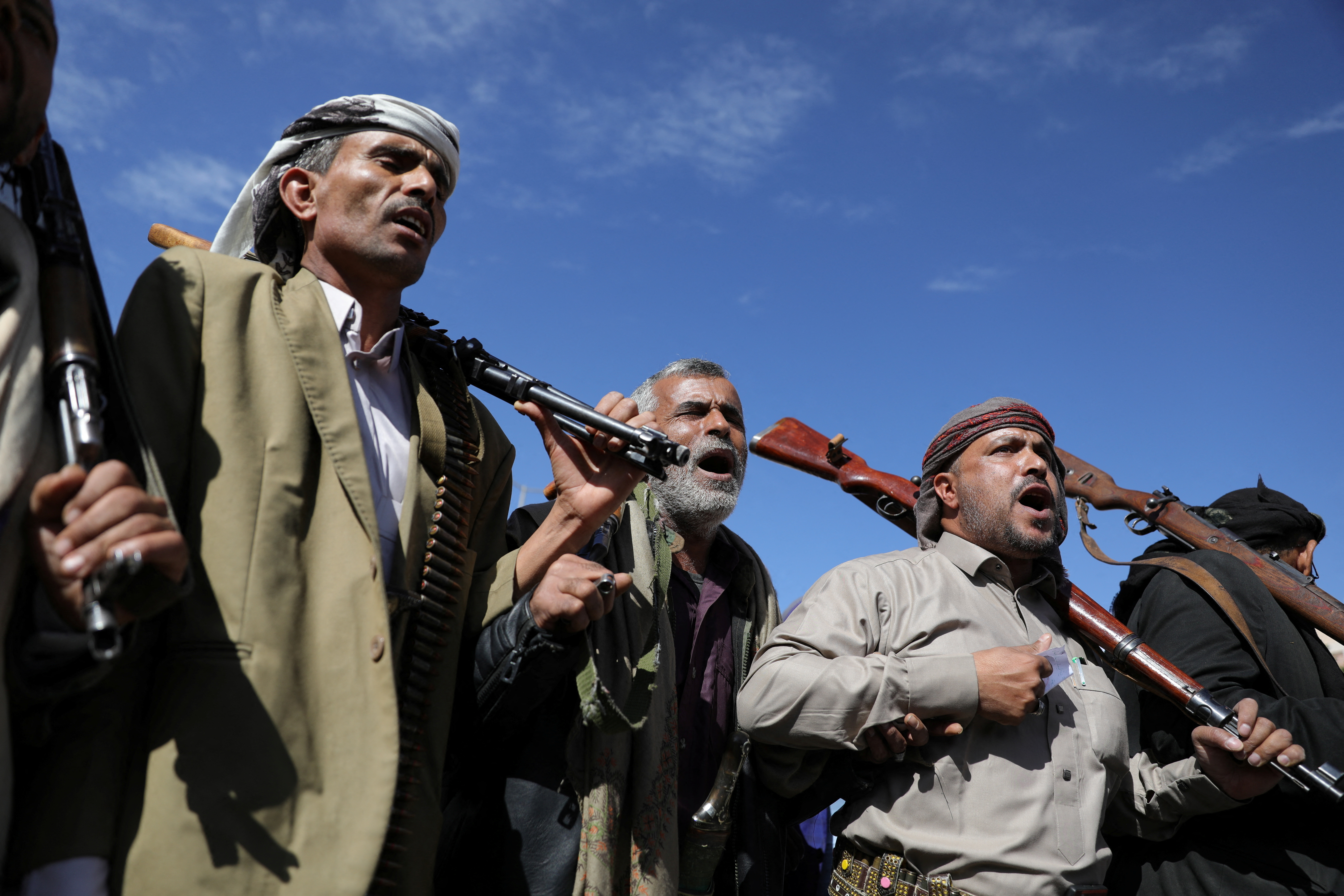 Houthi followers parade in Sanaa