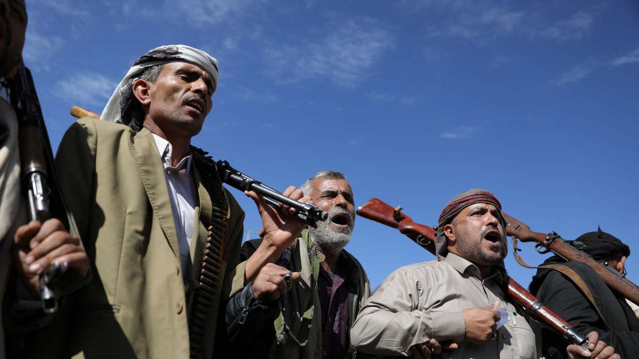 Houthi followers parade in Sanaa