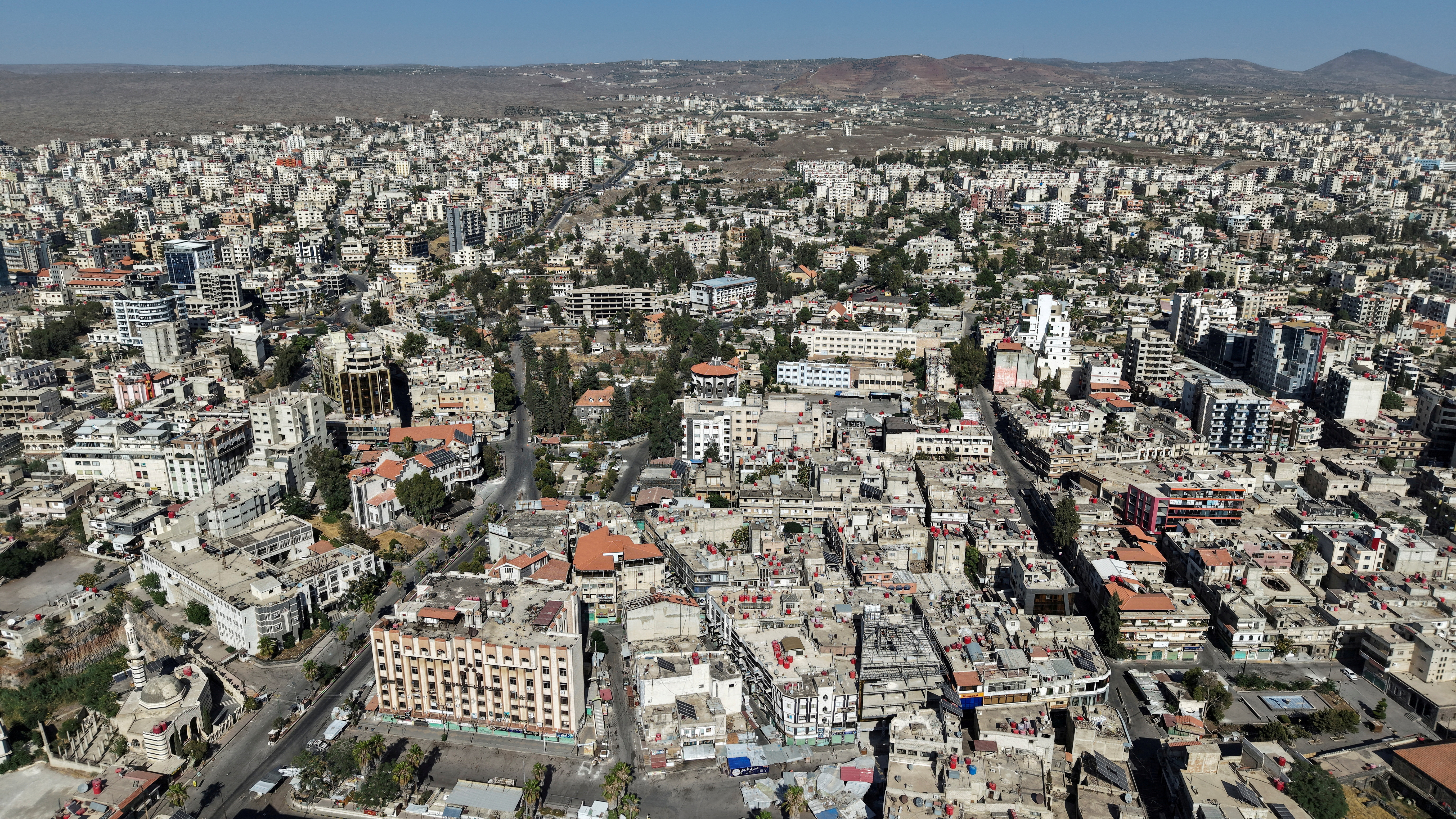 FILE PHOTO: Aftermath of deadly clashes between Druze fighters, Sunni Bedouin tribes and government forces, in Sweida
