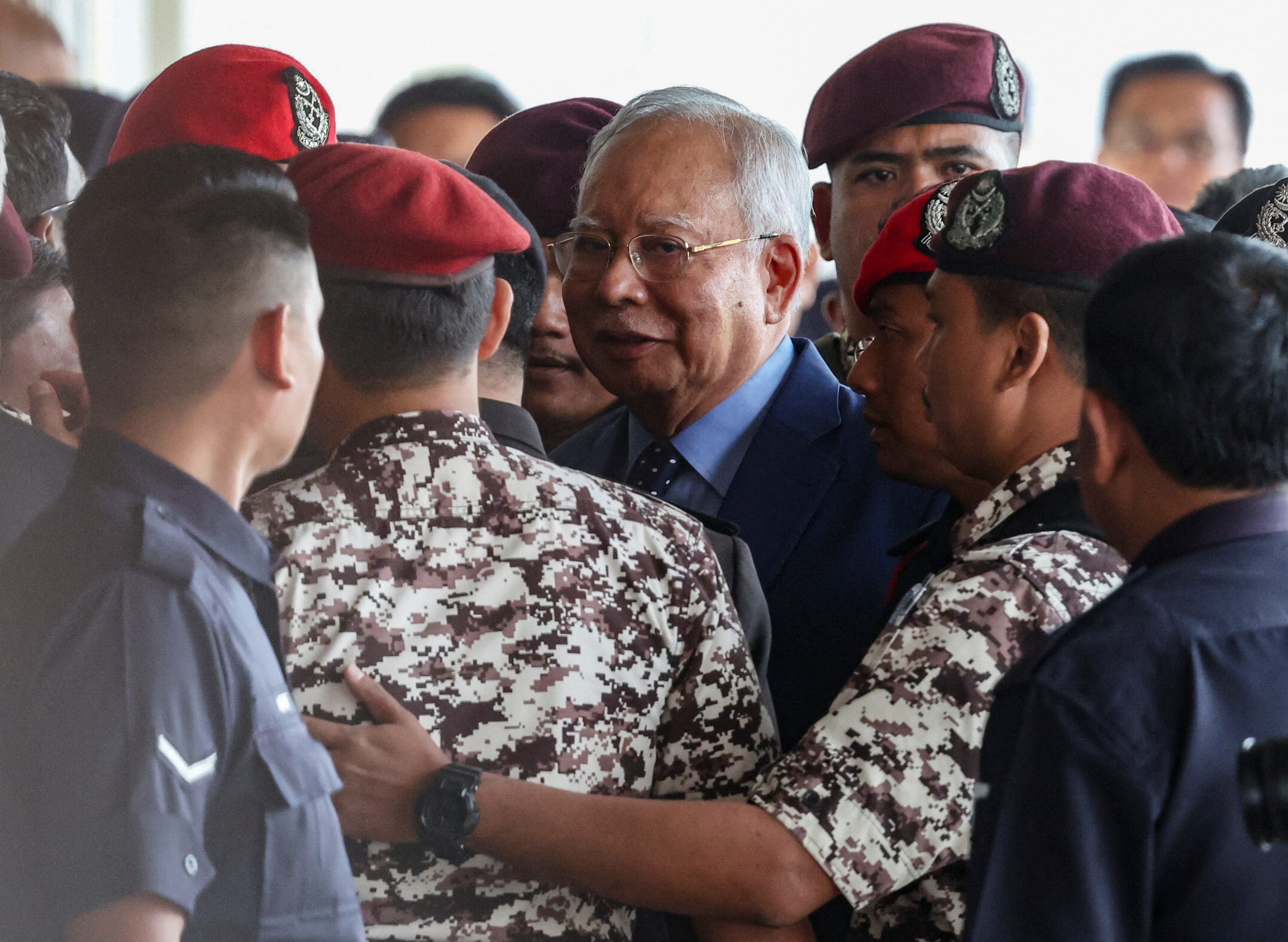 Former Malaysian Prime Minister Najib Razak arrives at the Kuala Lumpur court complex for his 1MDB corruption case, in Kuala Lumpur