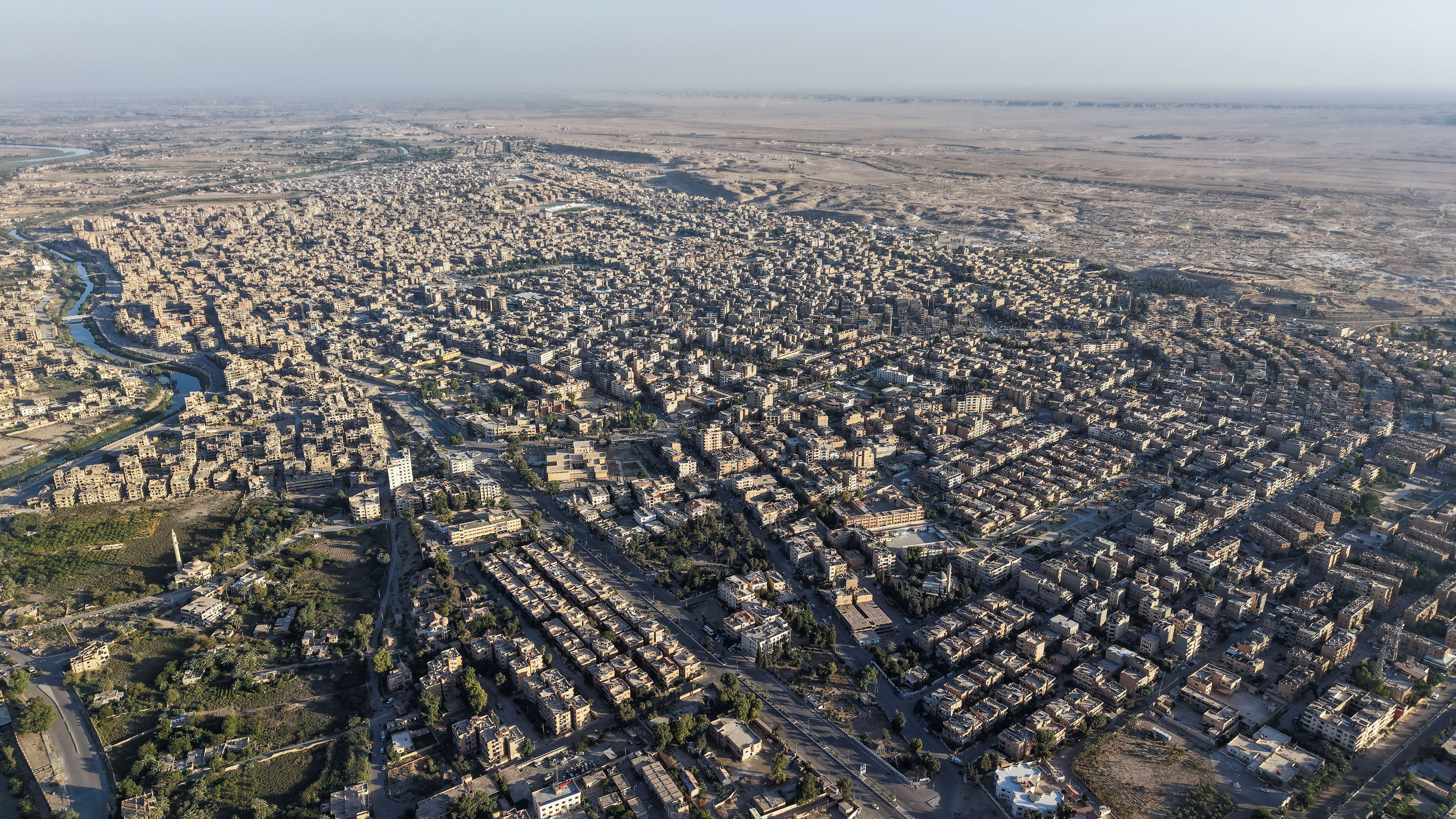 A drone view shows a general panorama of Deir el-Zor