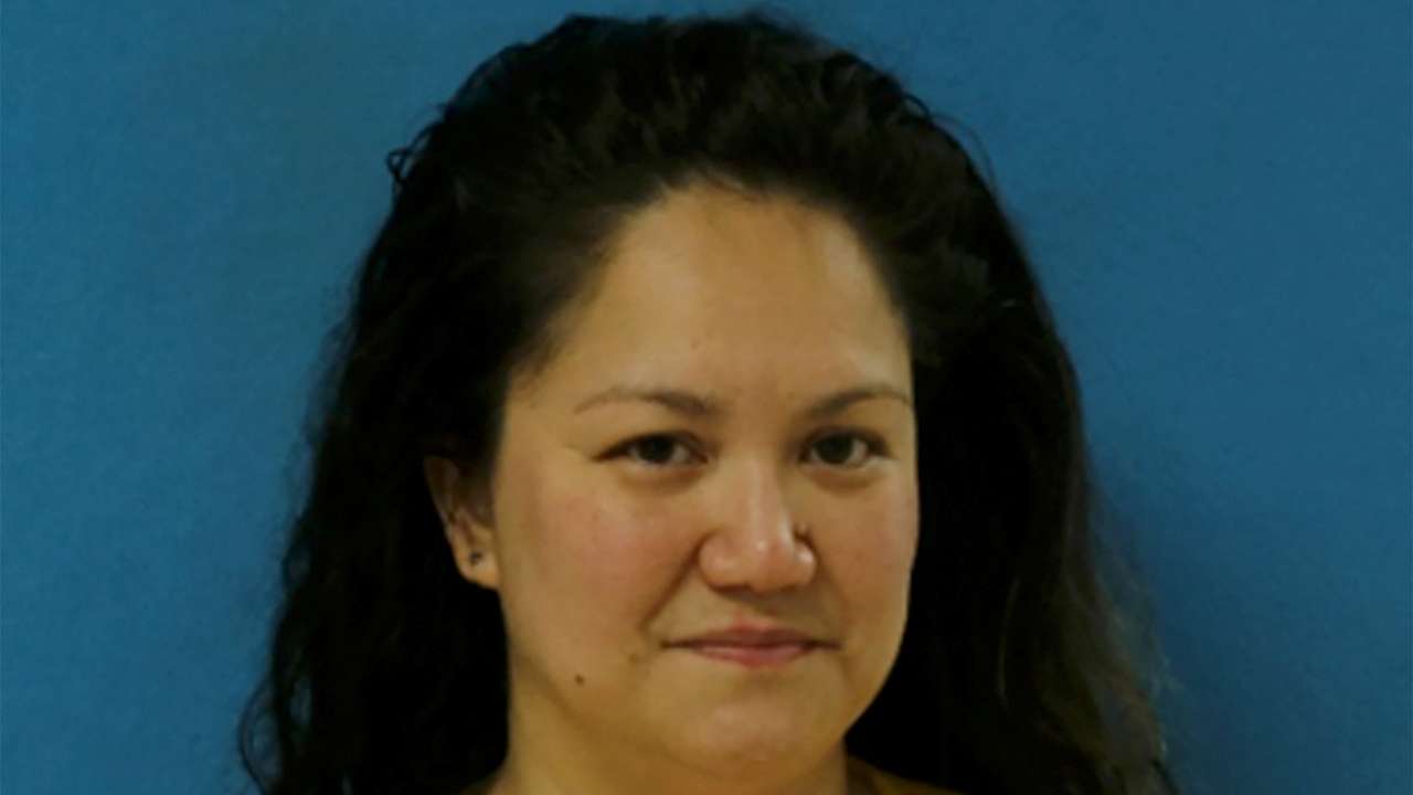 Elizabeth Wolf poses for an undated police booking photograph