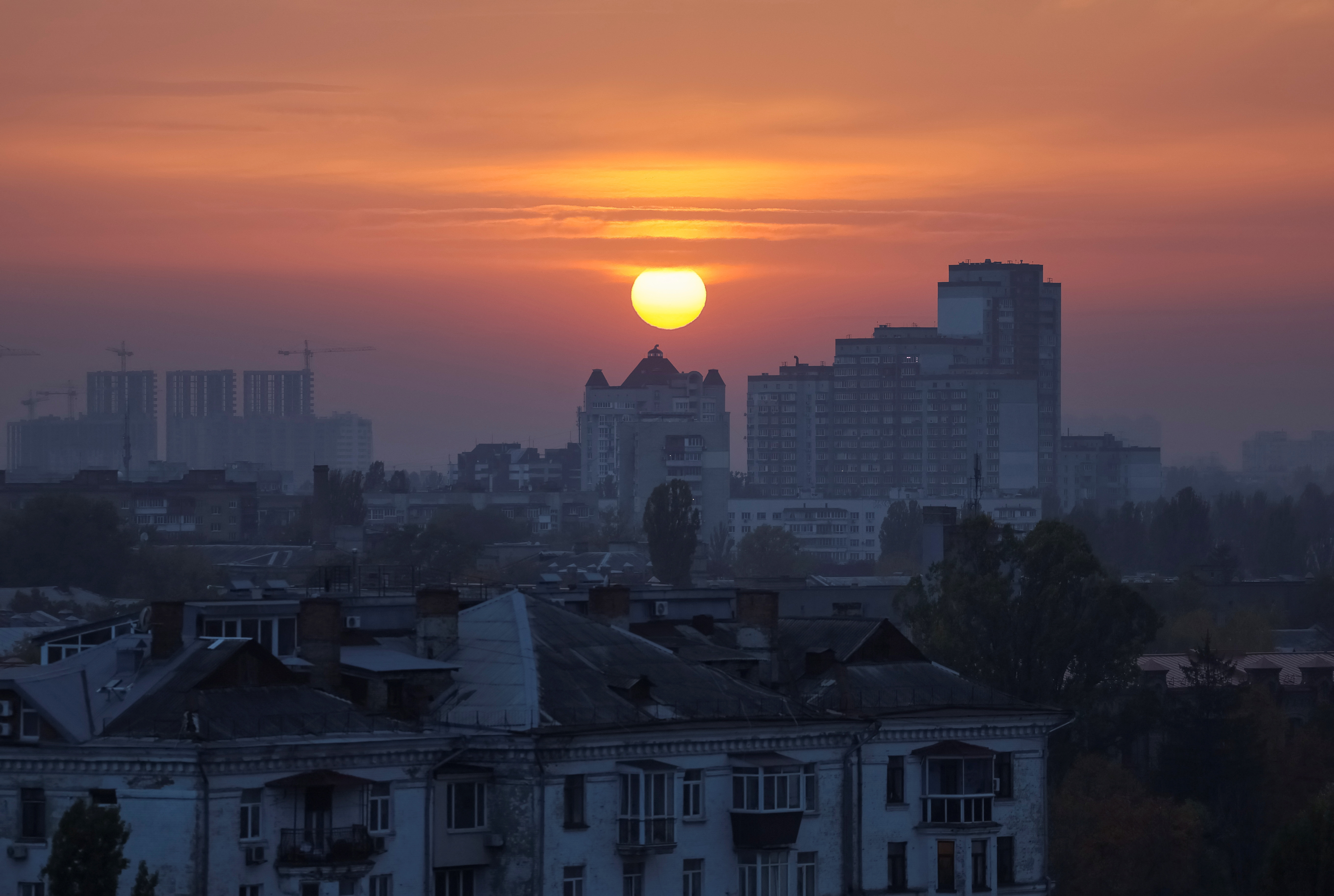 A view of the city at sunset in Kyiv