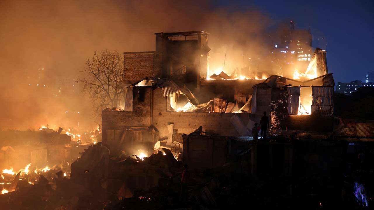 Flames engulf shanties after a fire broke out in Korail, Dhaka