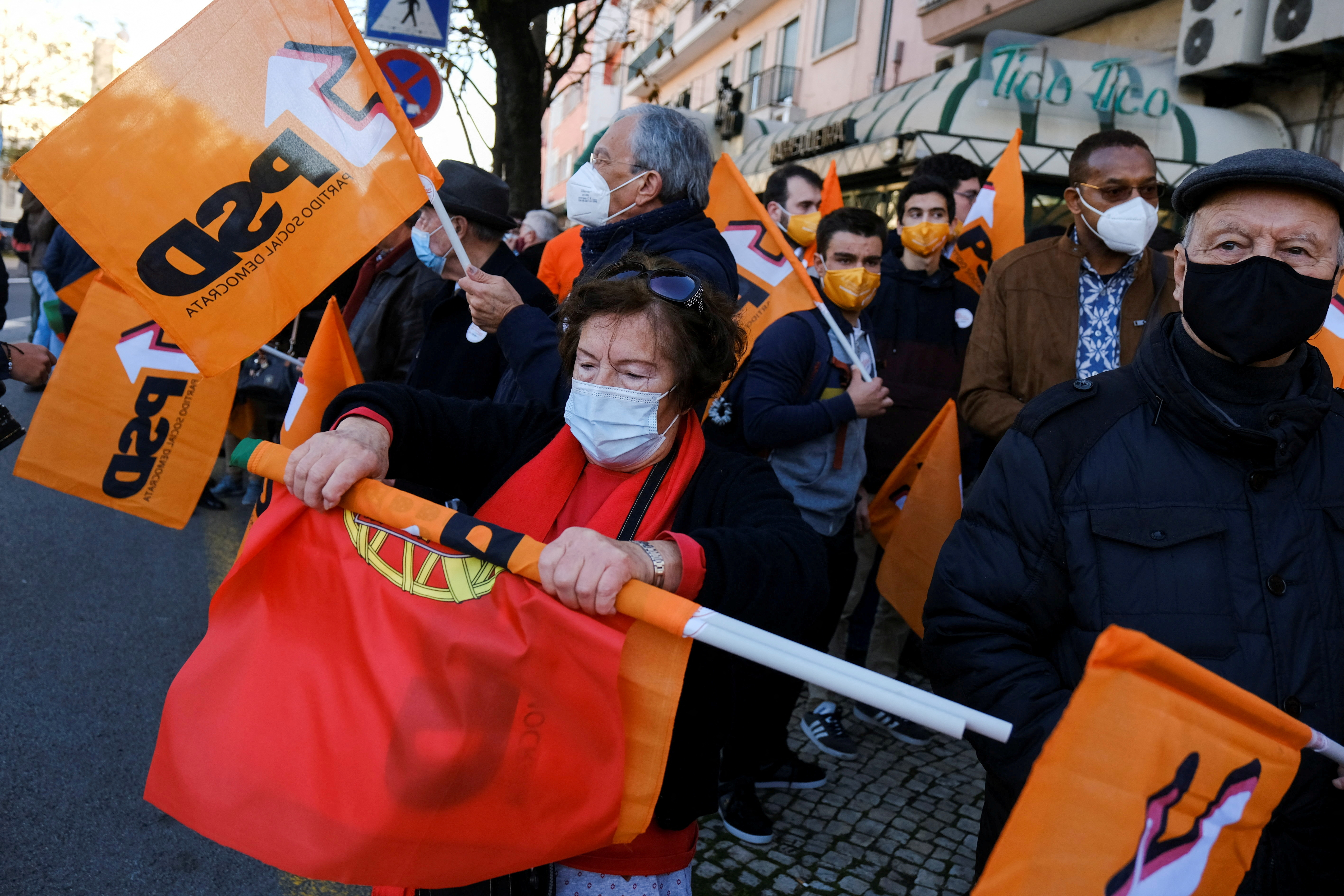 FILE PHOTO: People wait for Portugal's Social Democratic Party (PSD) leader Rui Rio to arrive for a campaign rally for Portugal's snap elections in Lisbon