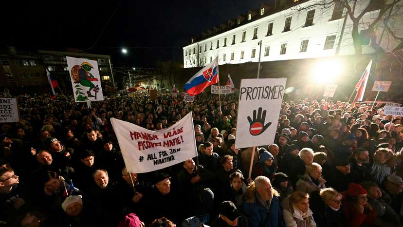 FILE PHOTO: Demonstrators attend a protest against the government's proposal to cancel a branch of prosecution, in Bratislava