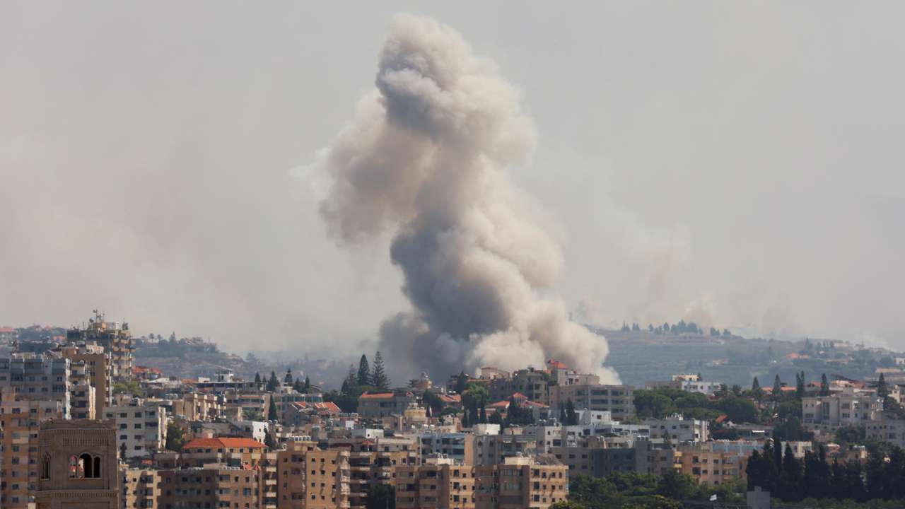 Smoke billows over southern Lebanon following Israeli strikes, as seen from Tyre, southern Lebanon