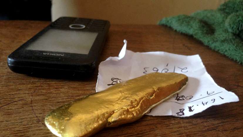 FILE PHOTO: A brick of gold is seen on an artisanal trader's desk in Tarkwa