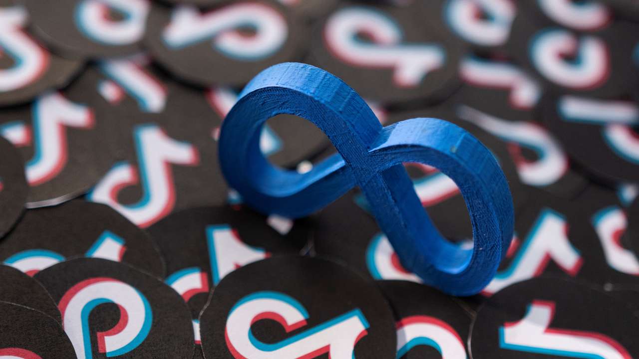 Illustration shows Meta and TikTok logos