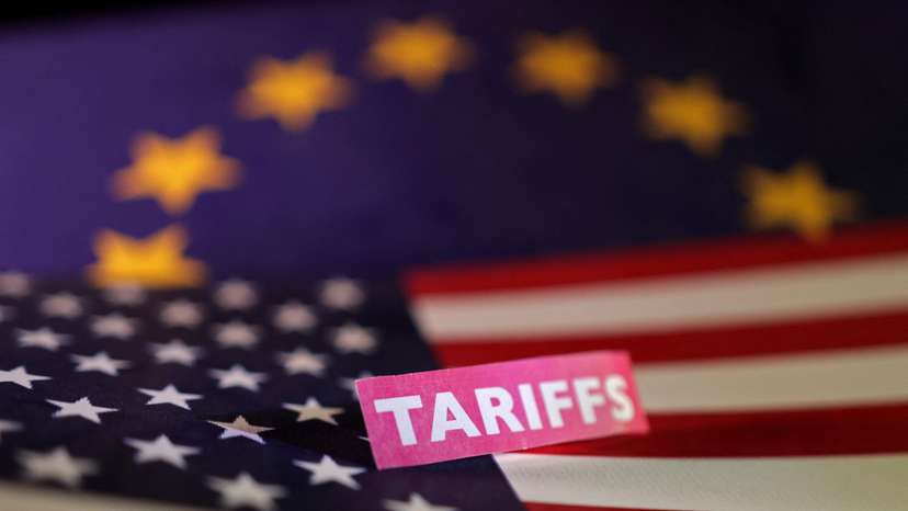 Illustration shows U.S. and European Union flags and "tariffs" label