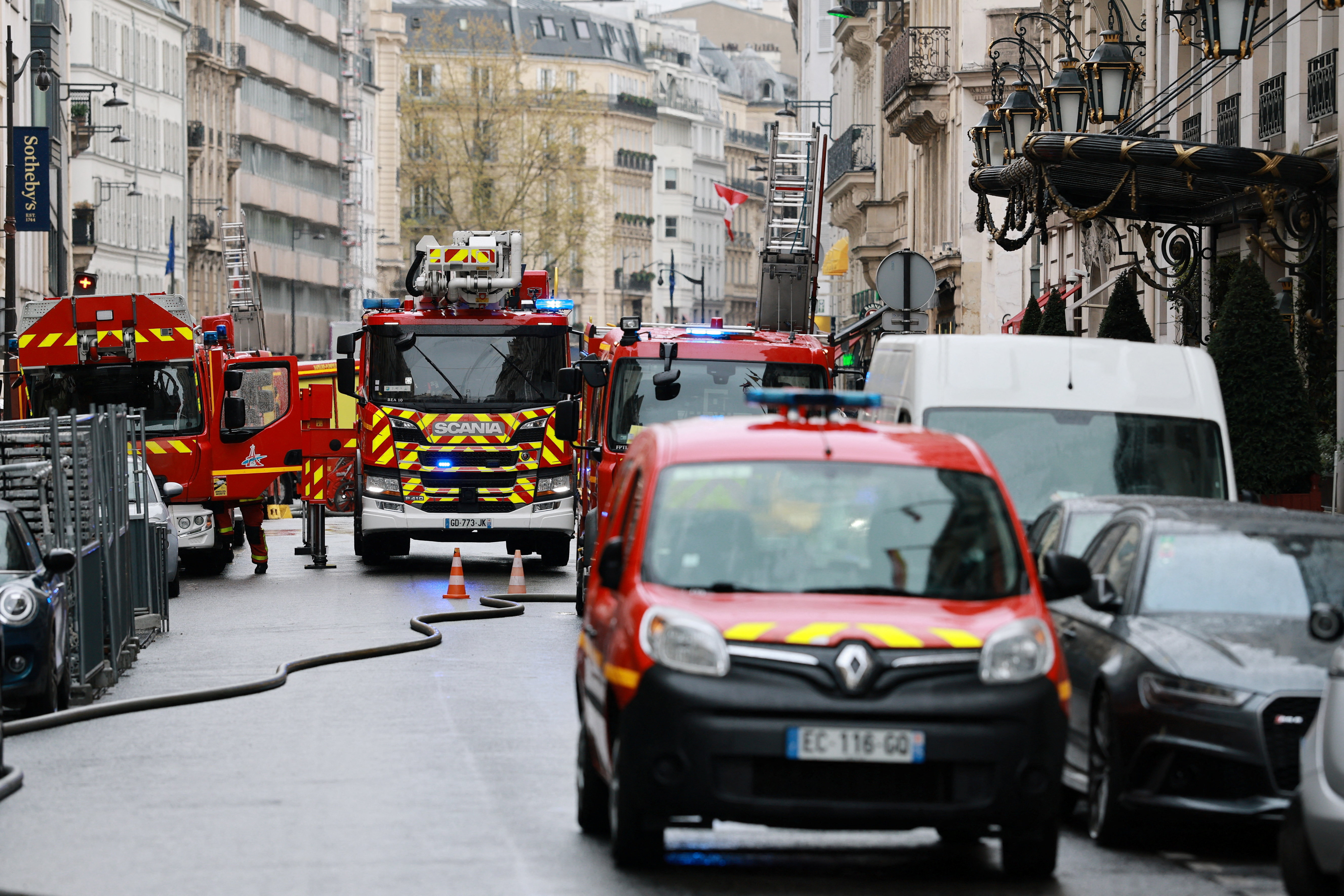 French firefighters work a fire broke out at Paris luxury Bristol Hotel