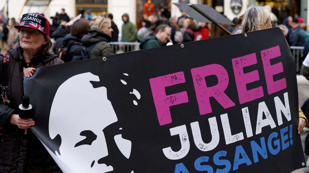FILE PHOTO: Supporters of WikiLeaks founder Julian Assange protest in Vienna