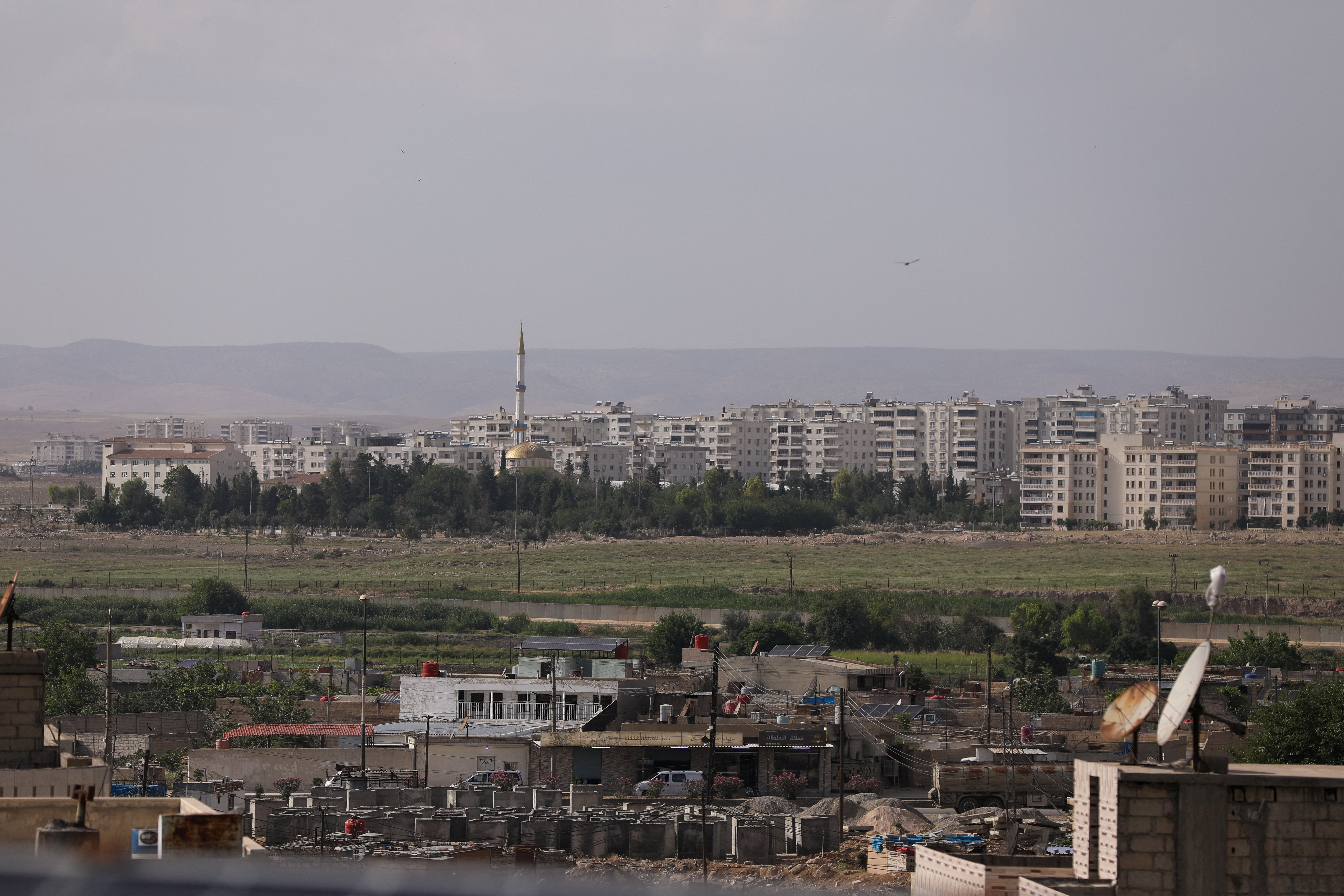 A view shows buildings in the Turkish city of Nusaybin, as seen from Qamishli