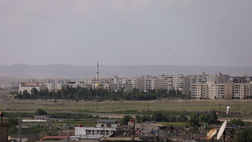 A view shows buildings in the Turkish city of Nusaybin, as seen from Qamishli