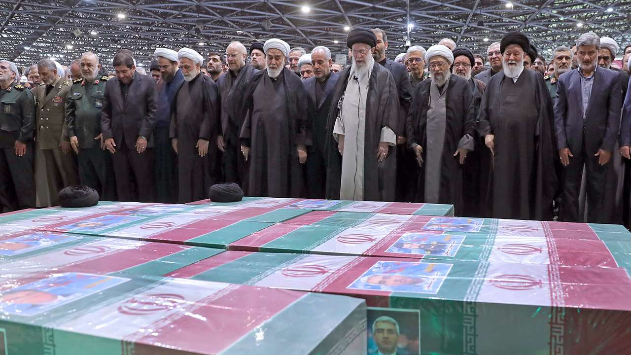 Iran's Supreme Leader Ayatollah Ali Khamenei performs prayer at a funeral for victims of helicopter crash, in Tehran