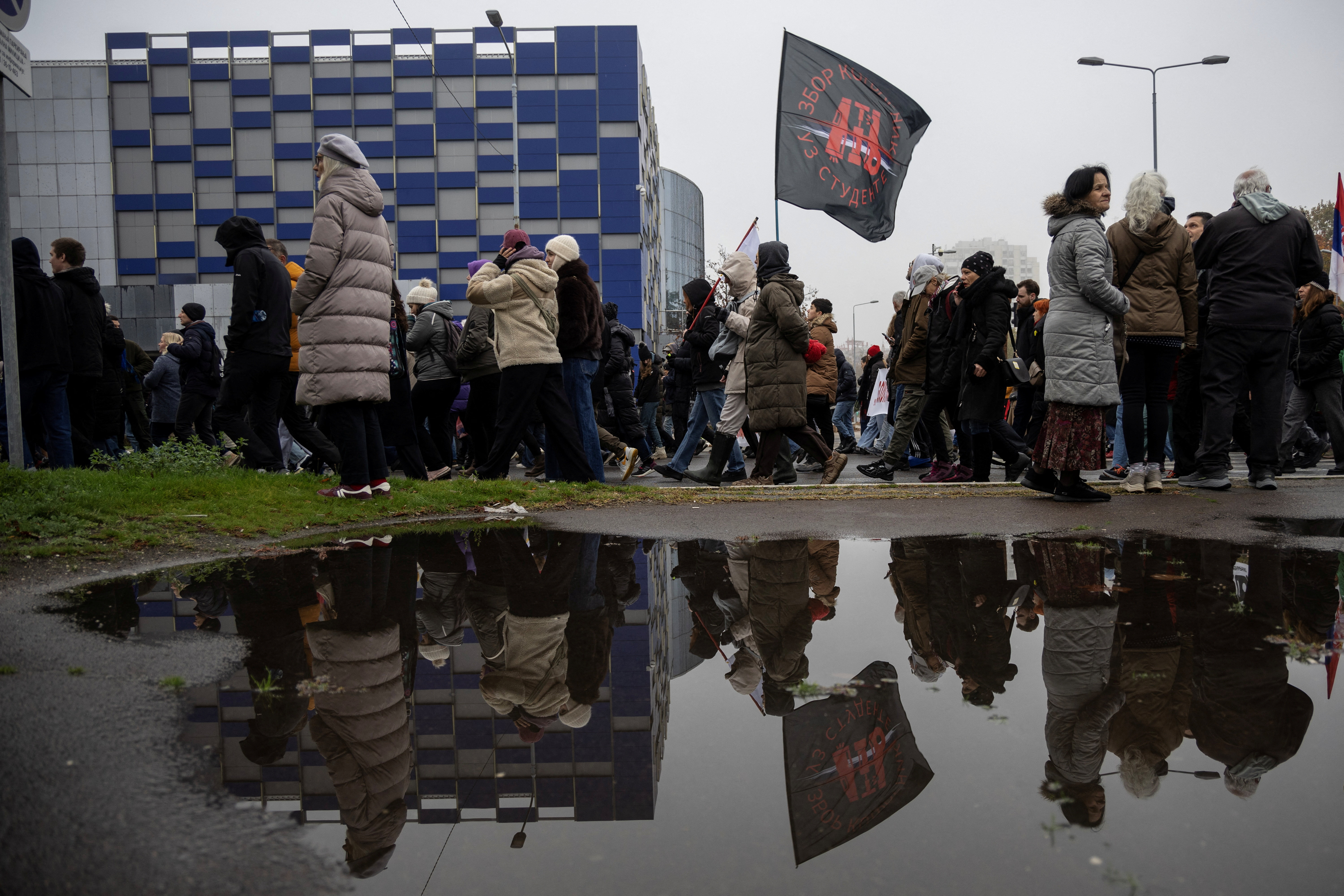 Students and citizens rally a year after starting their protest movement in Belgrade