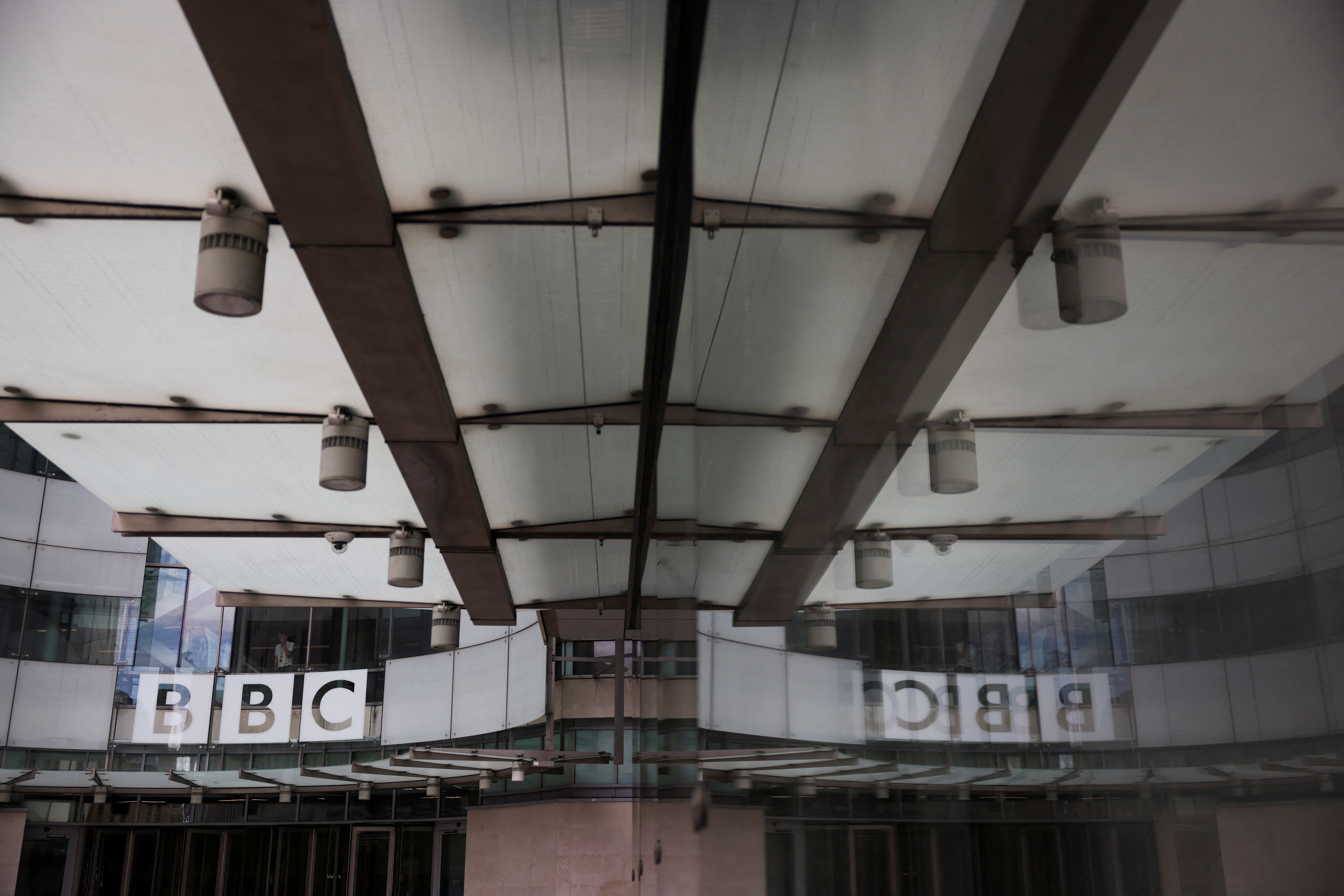 The BBC logo is displayed above the entrance to the BBC headquarters in London