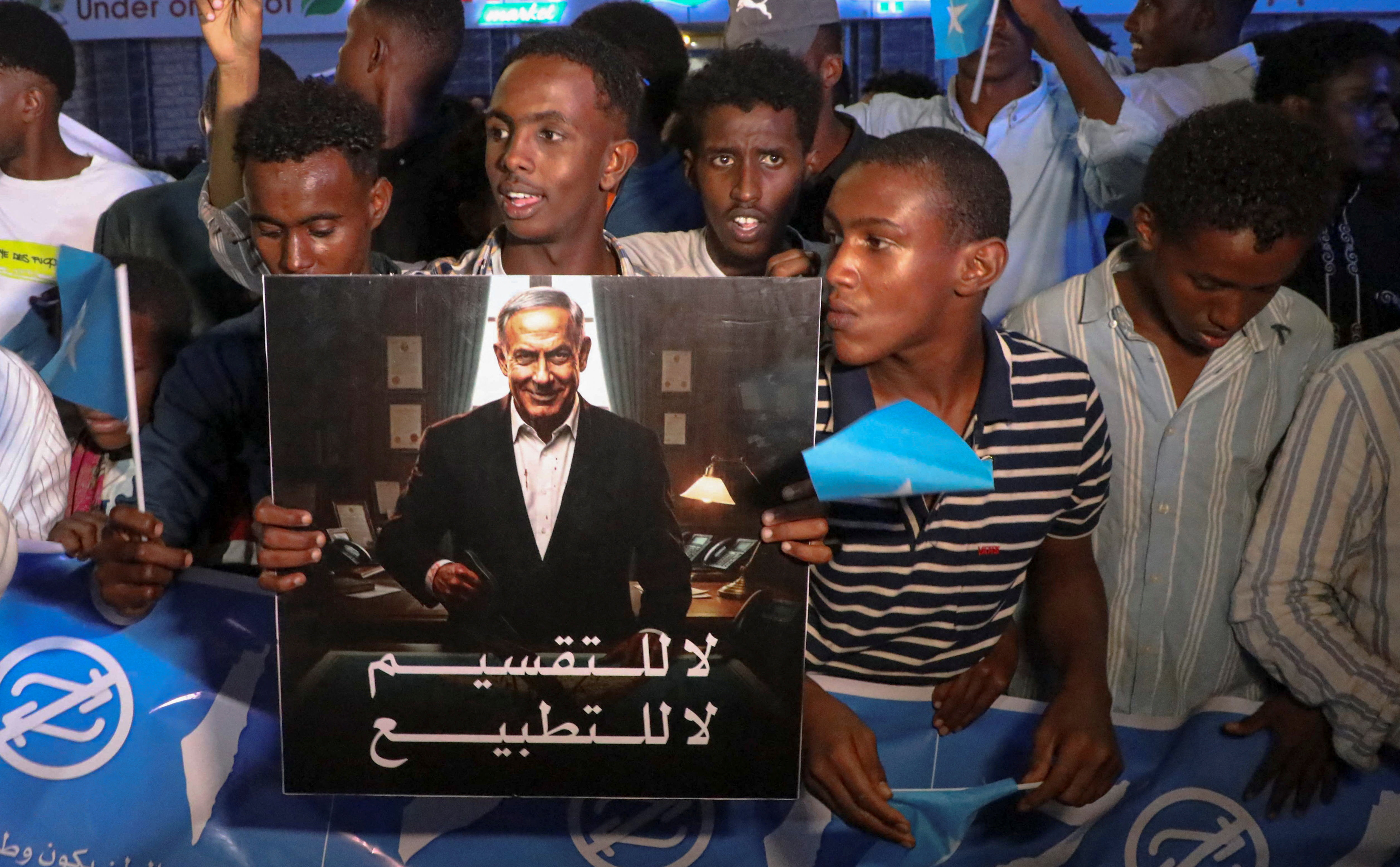Somalis attend a demonstration in Mogadishu as Israel becomes first country to formally recognize Somaliland as independent state