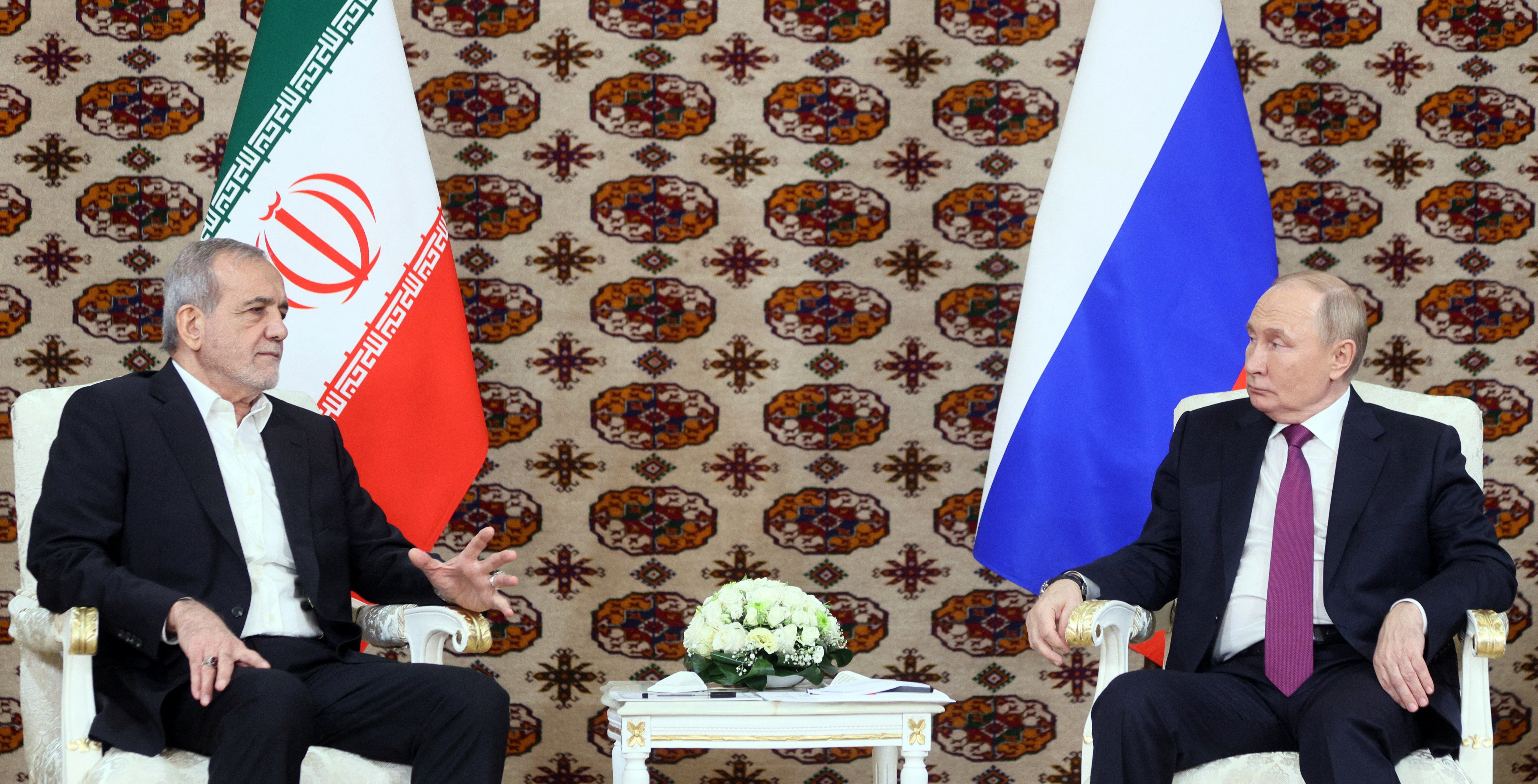 Russian President Vladimir Putin meets Iranian counterpart Masoud Pezeshkian on the sidelines of a cultural forum in Ashgabat