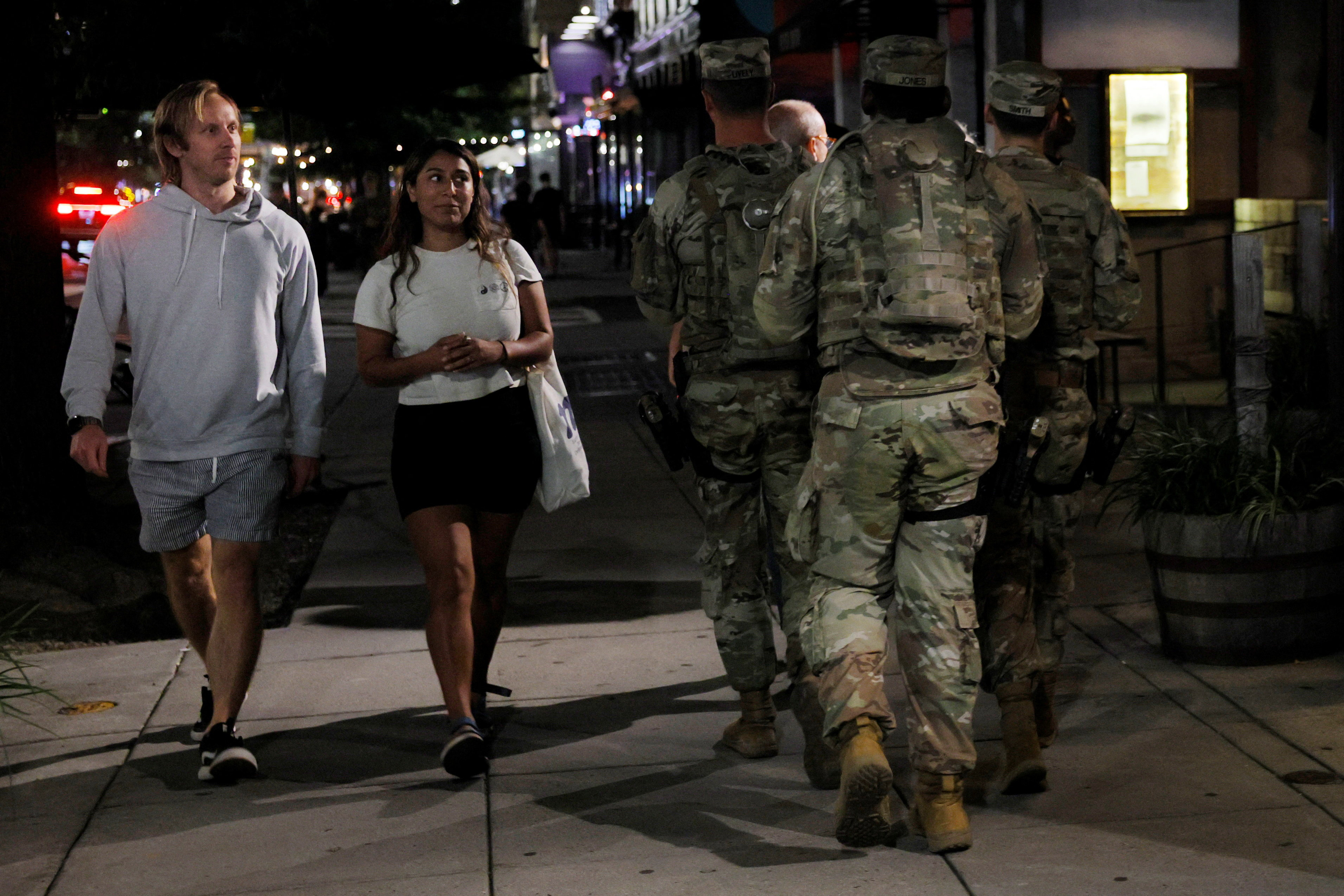 Members of the Ohio National Guard wear their sidearms while patrolling in Washington