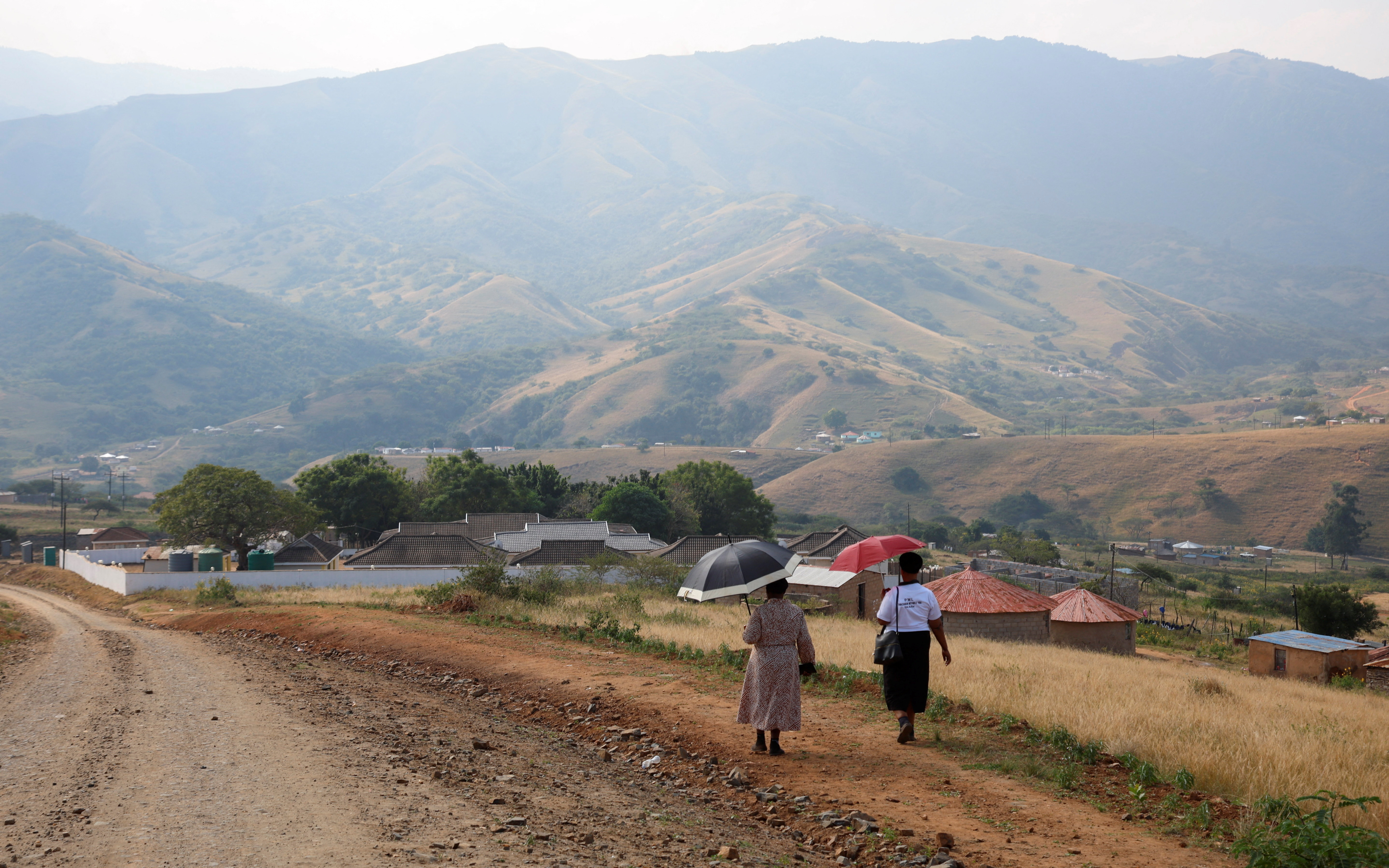 Women walk to church in Nkandla