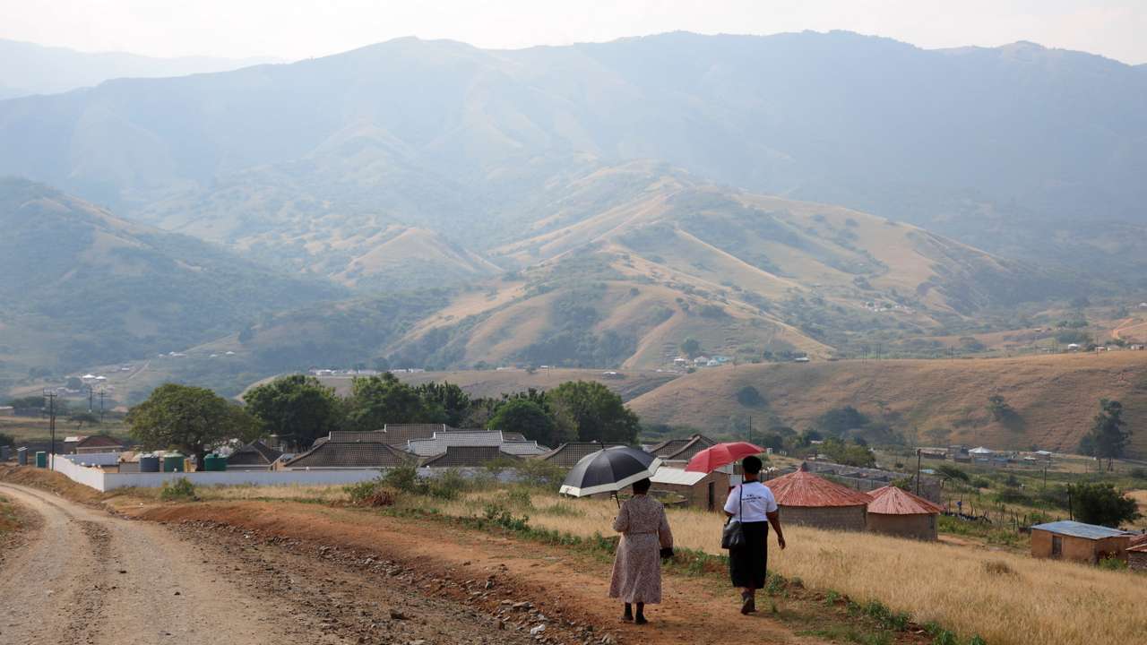 Women walk to church in Nkandla