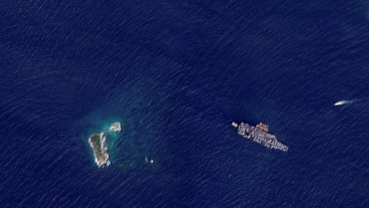 A satellite image shows the USS Gerald R. Ford off the coast of St Thomas Island
