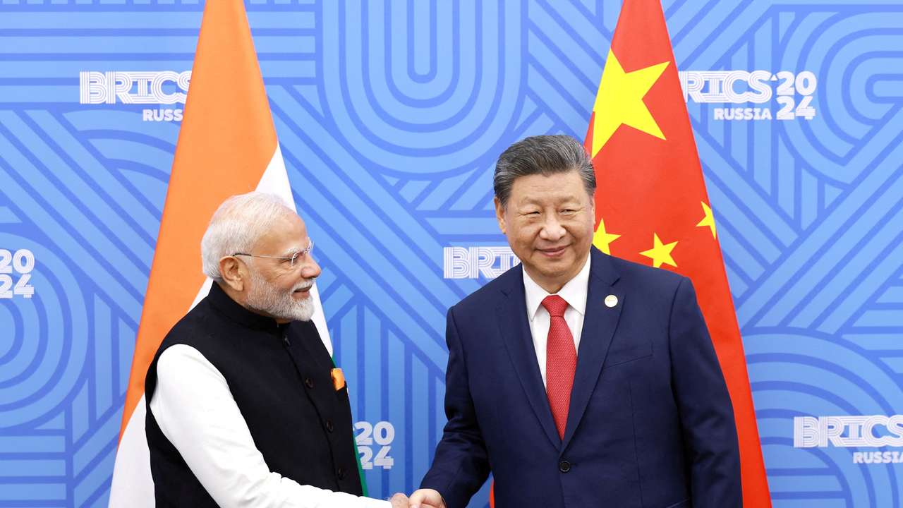 FILE PHOTO: Chinese President Xi and India Prime Minister Modi meet in Kazan