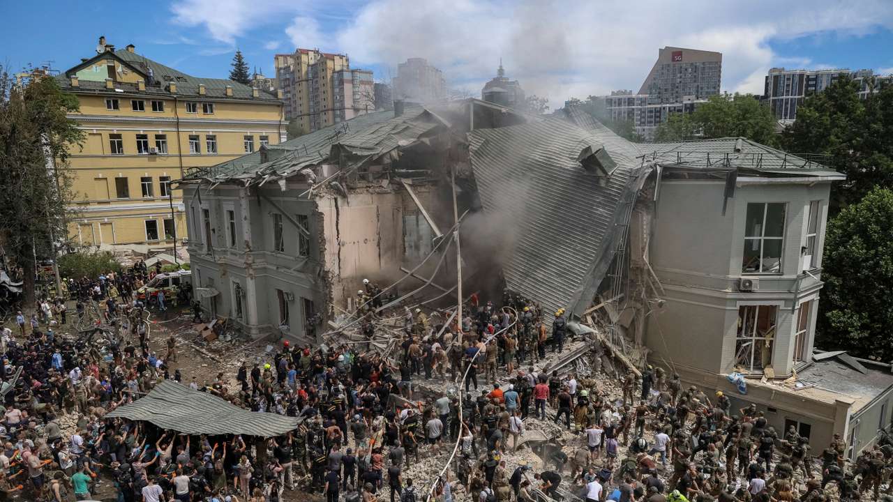 FILE PHOTO: Rescuers work at Ohmatdyt Children's Hospital that was damaged during Russian missile strikes, in Kyiv
