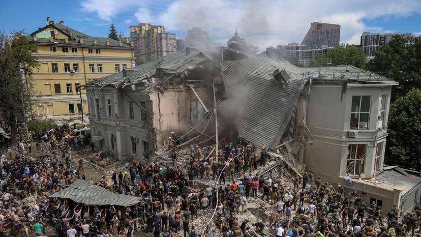 FILE PHOTO: Rescuers work at Ohmatdyt Children's Hospital that was damaged during Russian missile strikes, in Kyiv