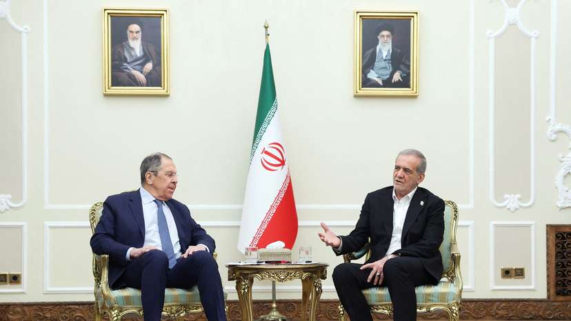 Iranian President Masoud Pezeshkian meets with Russia's Foreign Minister Sergei Lavrov in Tehran