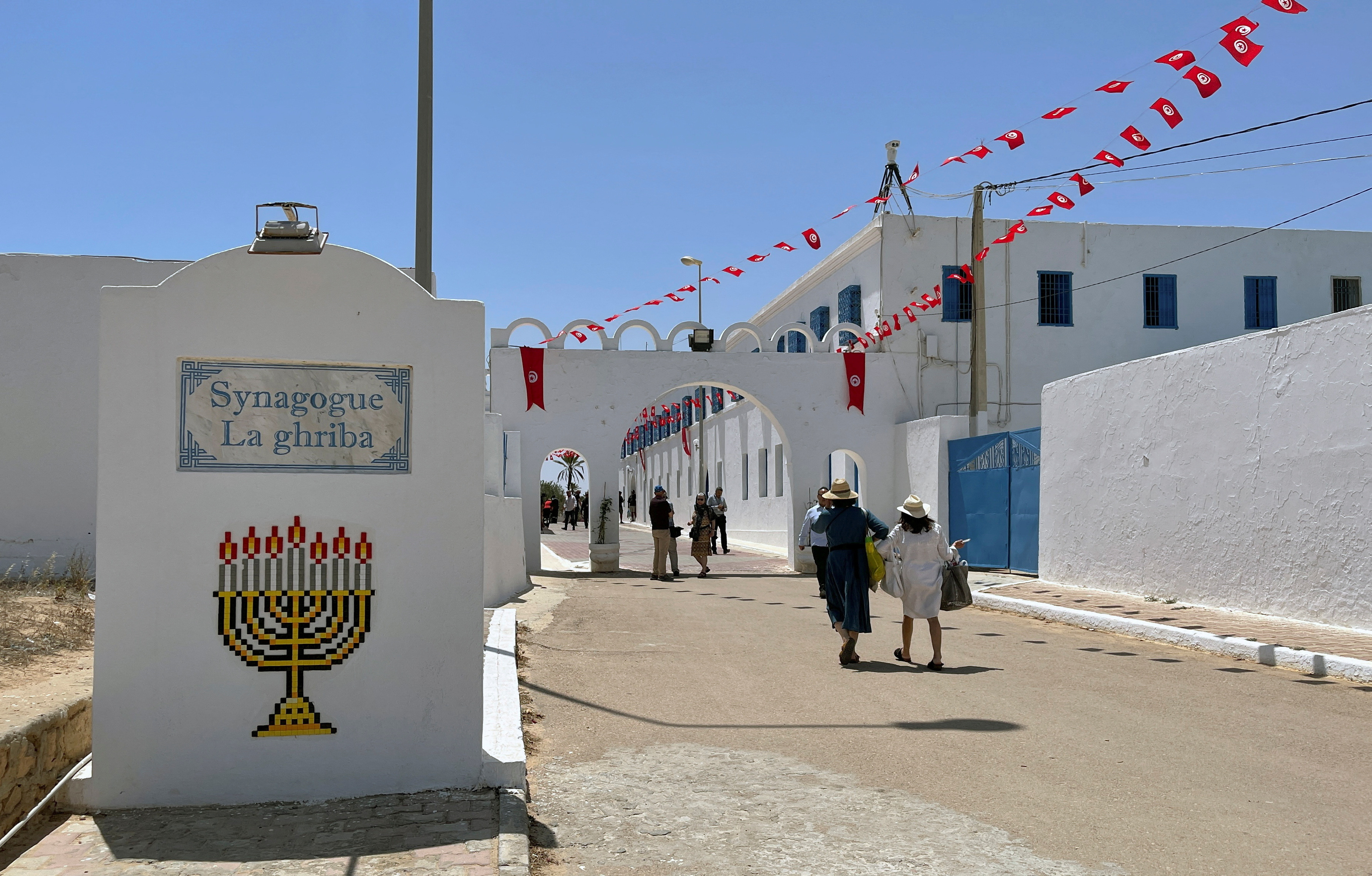 FILE PHOTO: Jewish worshippers arrive at the Ghriba synagogue, during an annual pilgrimage in Djerba