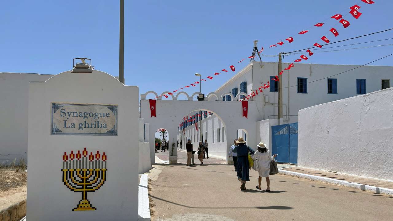 FILE PHOTO: Jewish worshippers arrive at the Ghriba synagogue, during an annual pilgrimage in Djerba