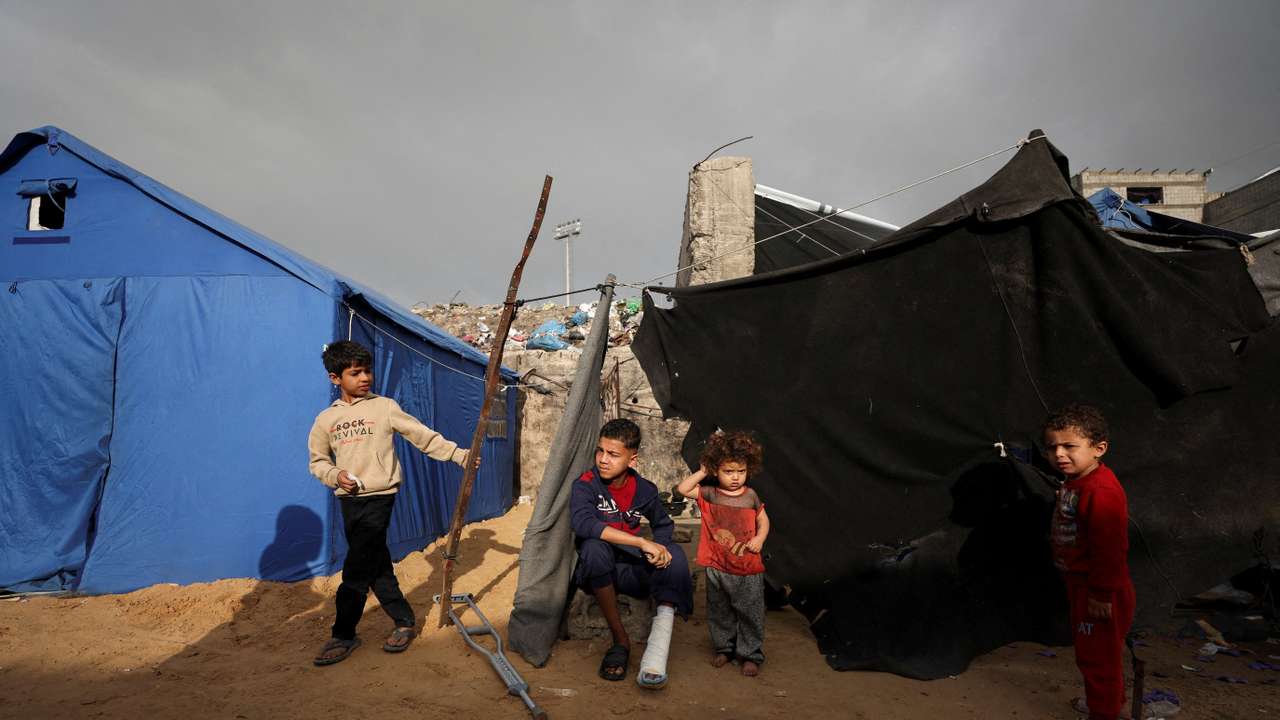 Displaced Palestinians shelter at a tent camp in Gaza City