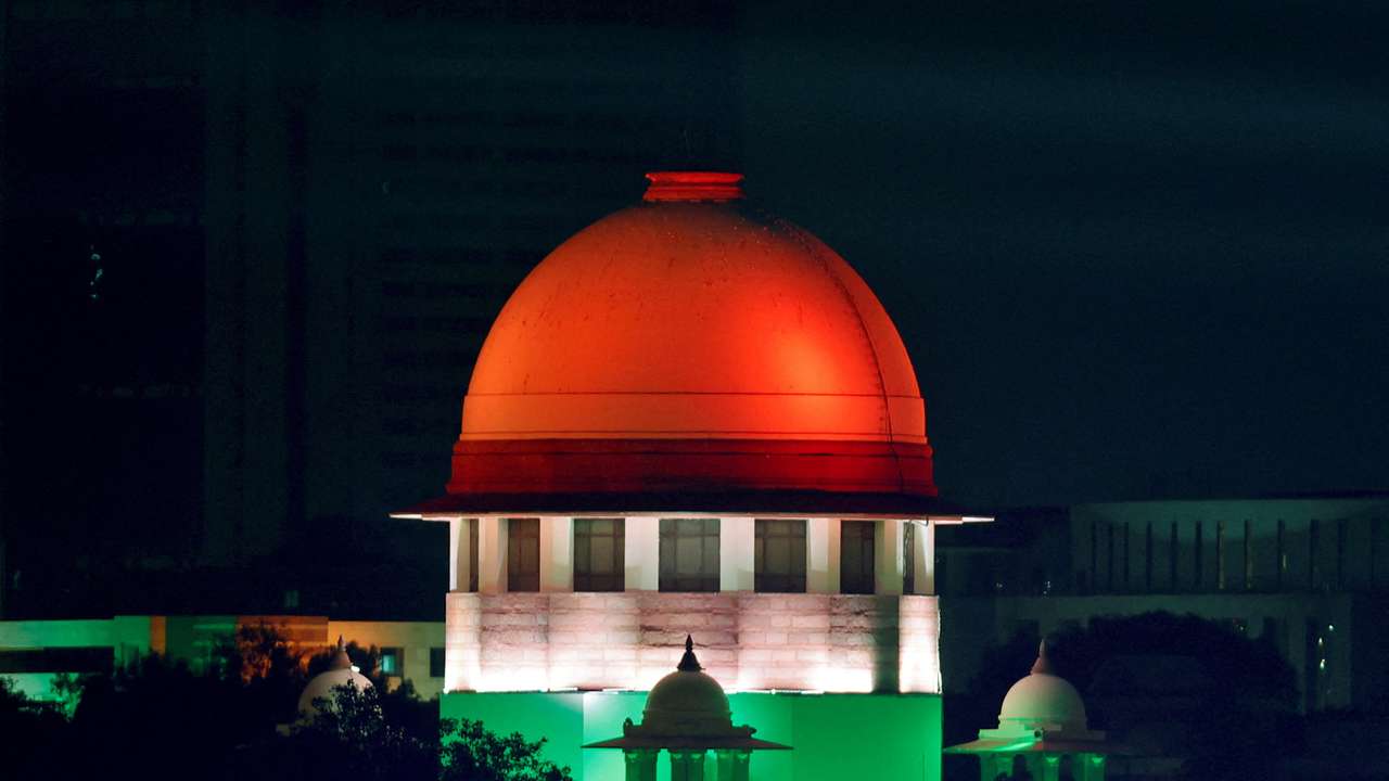FILE PHOTO: Illuminated Supreme Court building is pictured from the International Media Center during the G20 Summit in New Delhi