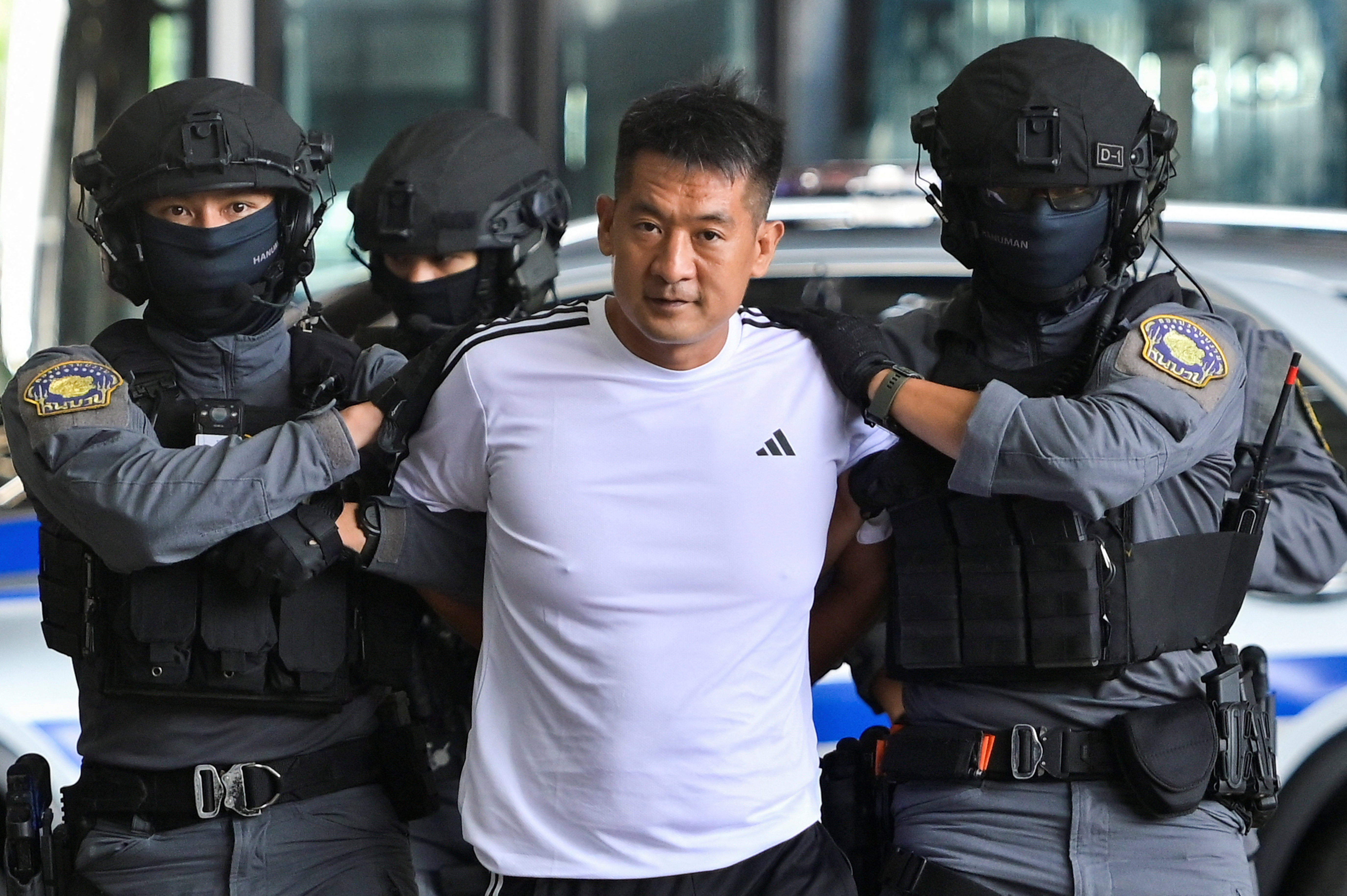 Thailand extradites gambling kingpin She Zhijiang to China, in Bangkok