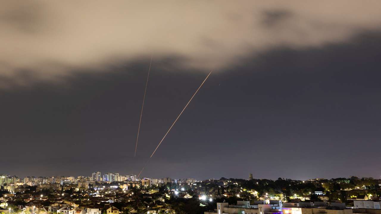 An anti-missile system operates after Iran launched drones and missiles towards Israel, as seen from Ashkelon