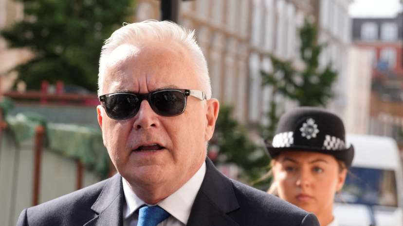 Court hearing as ex-BBC news presenter Huw Edwards charged with indecent child picture crimes, in London