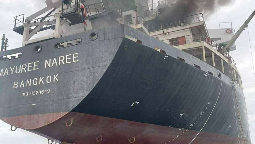 The Thailand-flagged cargo ship Mayuree Naree engulfed in black smoke in the Strait of Hormuz