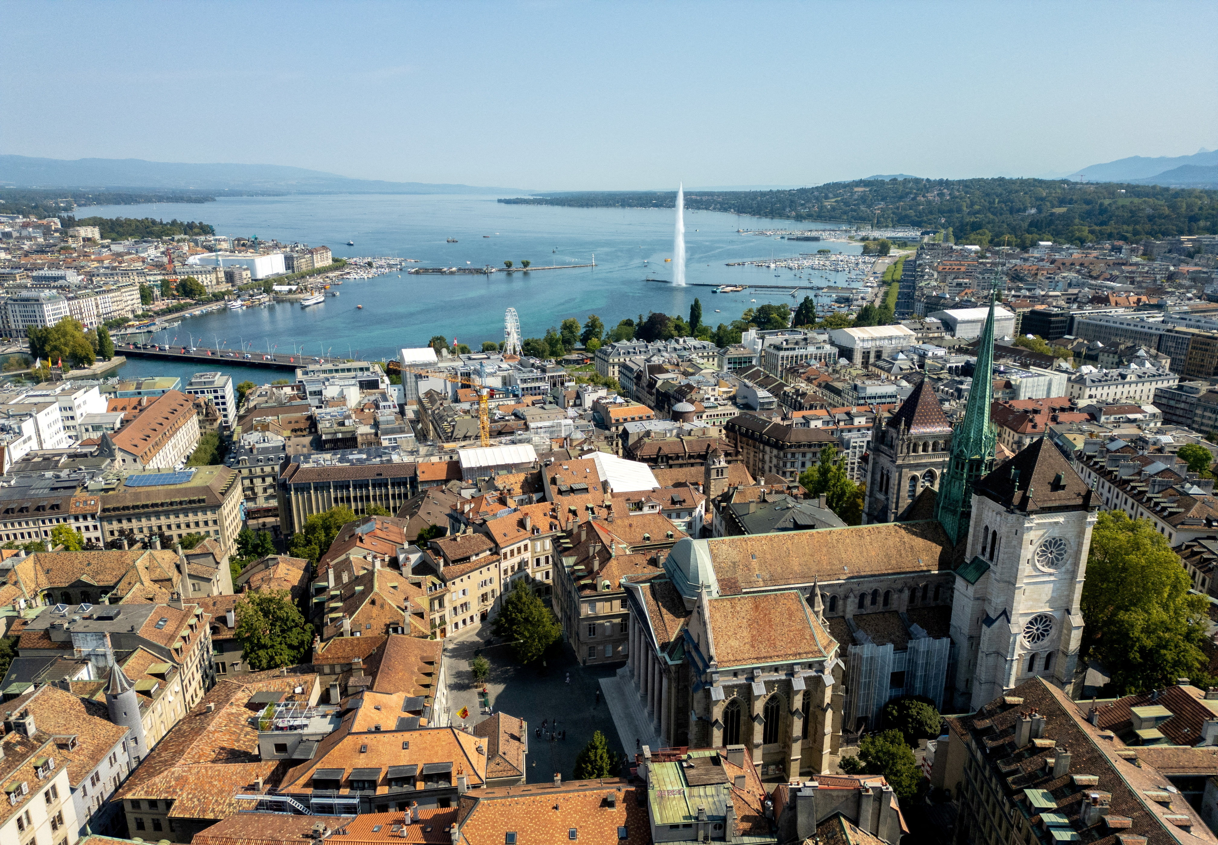 FILE PHOTO: A drone view shows the St. Pierre Cathedral and Lake Leman in Geneva