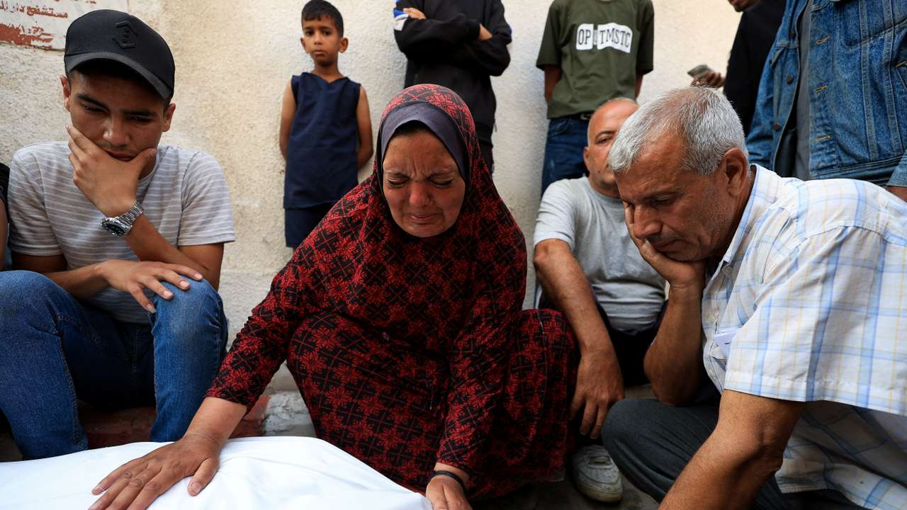 Mourners react during the funeral of Palestinians killed by Israeli fire, according to the Gaza health ministry, in Gaza City