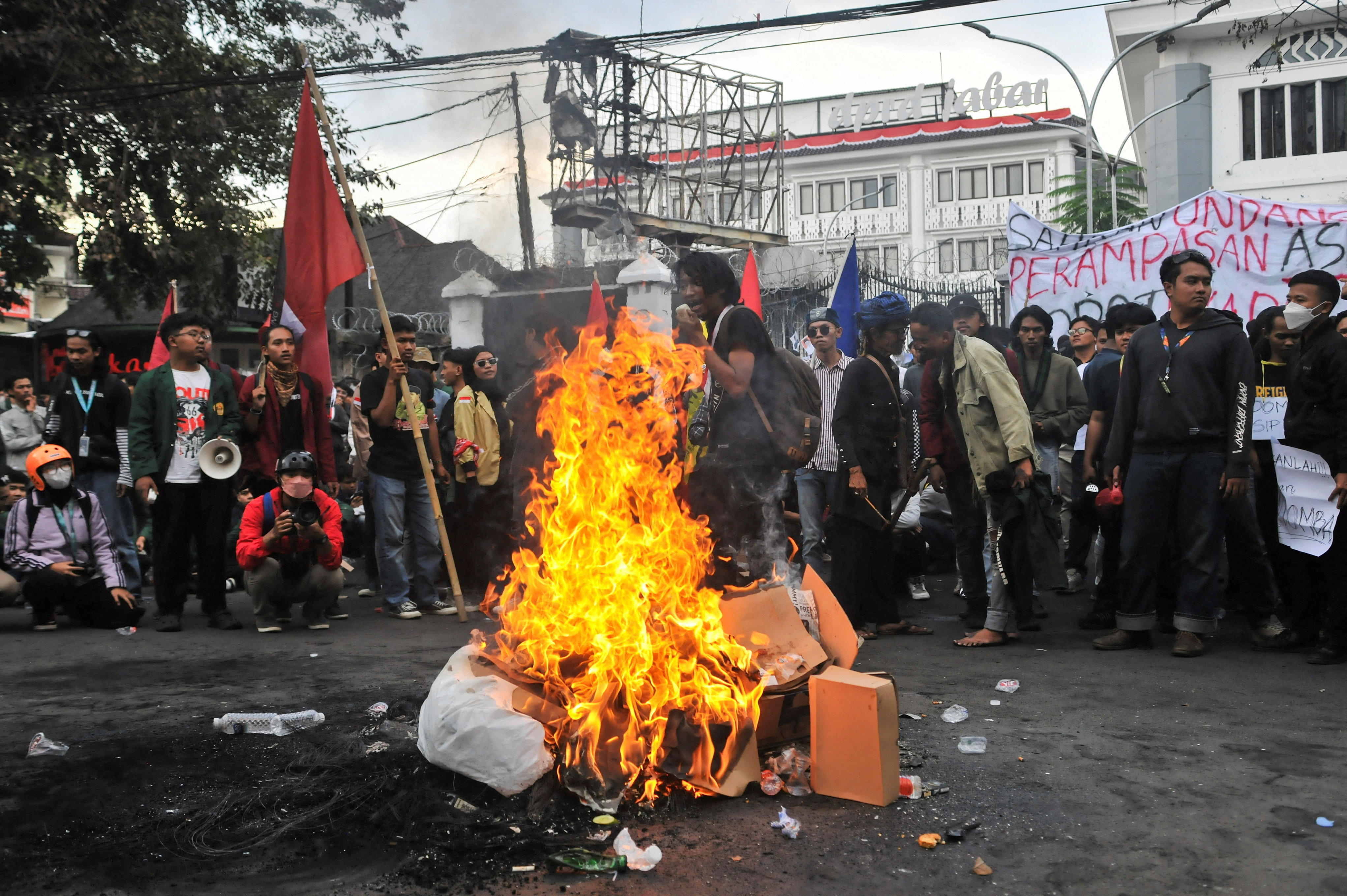 Anti-government protest outside regional parliament building in Bandung