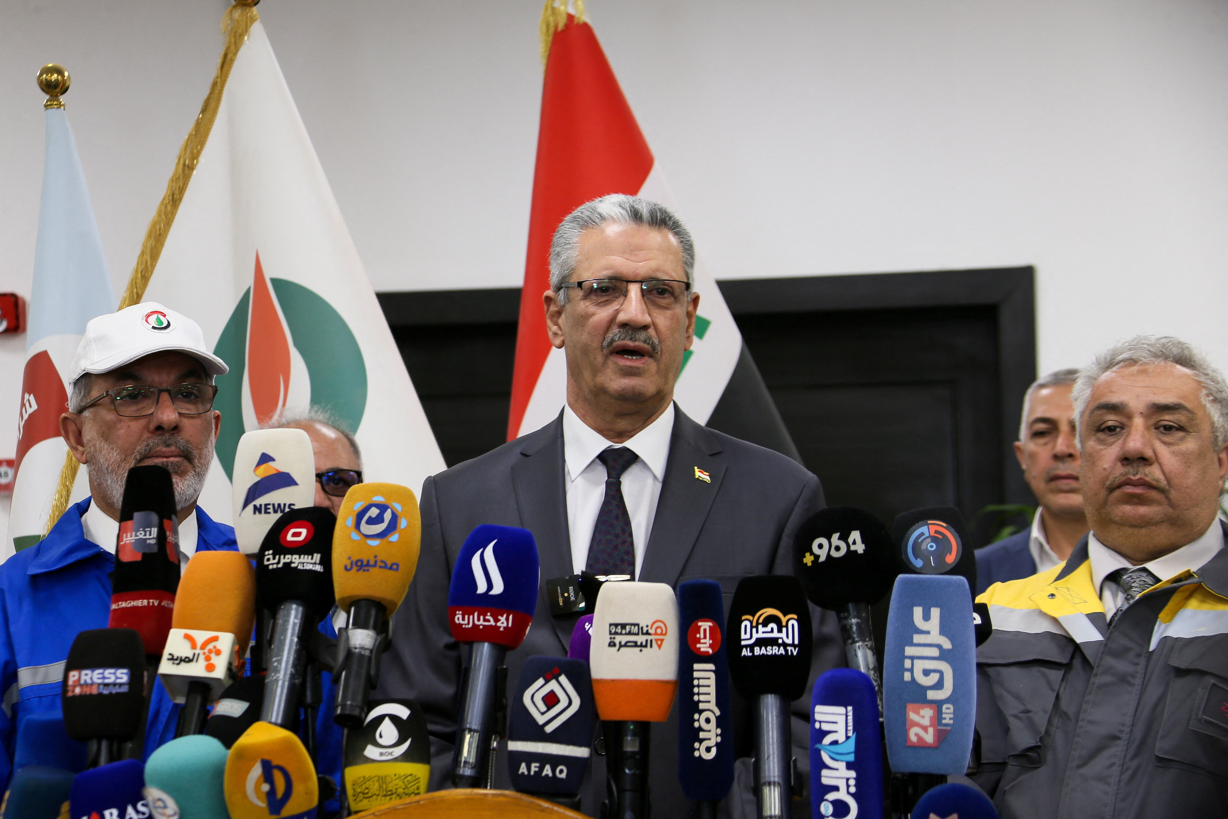 Iraq's Oil Minister Hayan Abdel-Ghani speaks to the media during a press conference at Zubair oilfield in Basra