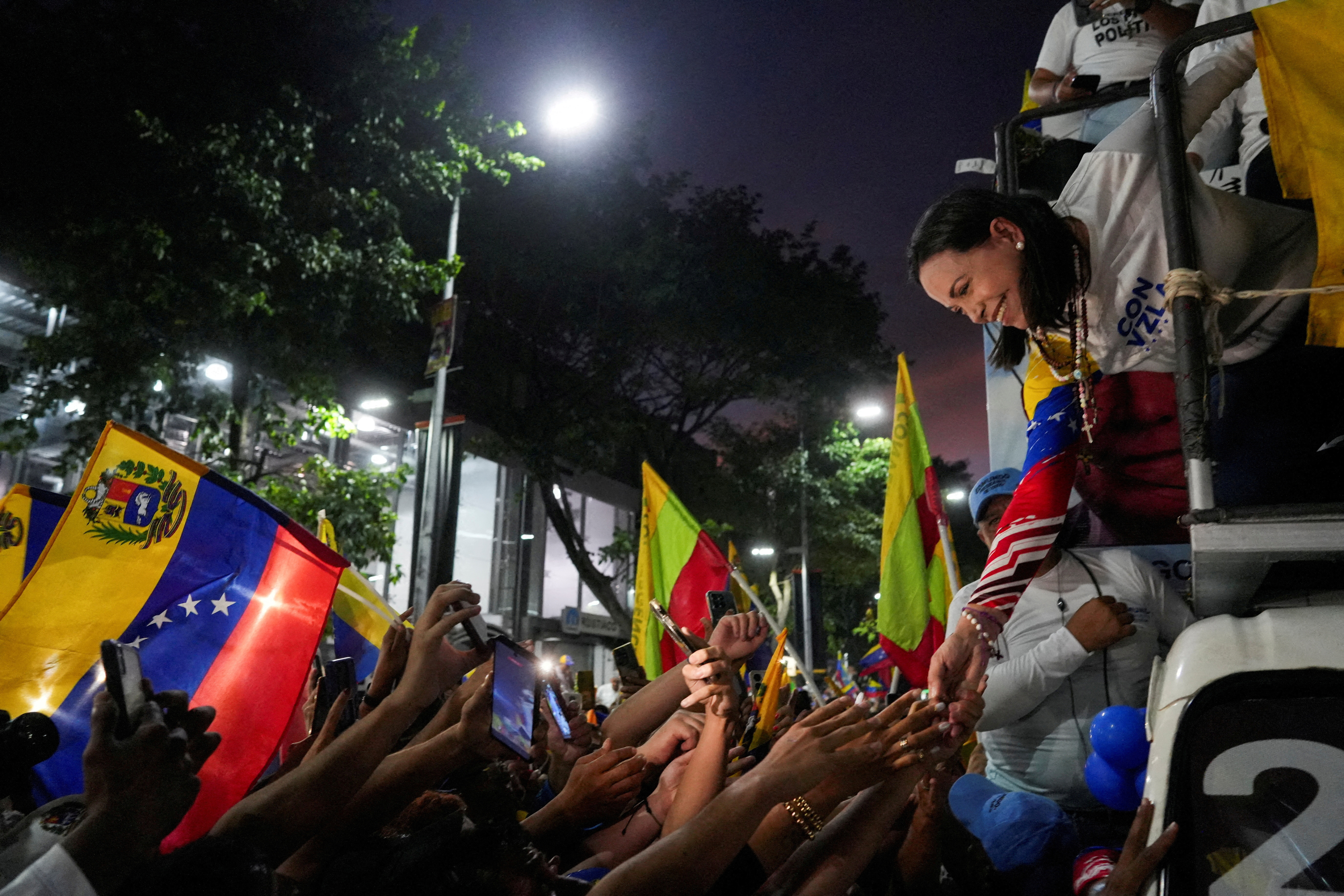 FILE PHOTO: Venezuela's opposition presidential candidate Edmundo Gonzalez and opposition leader Maria Corina Machado campaign in Caracas